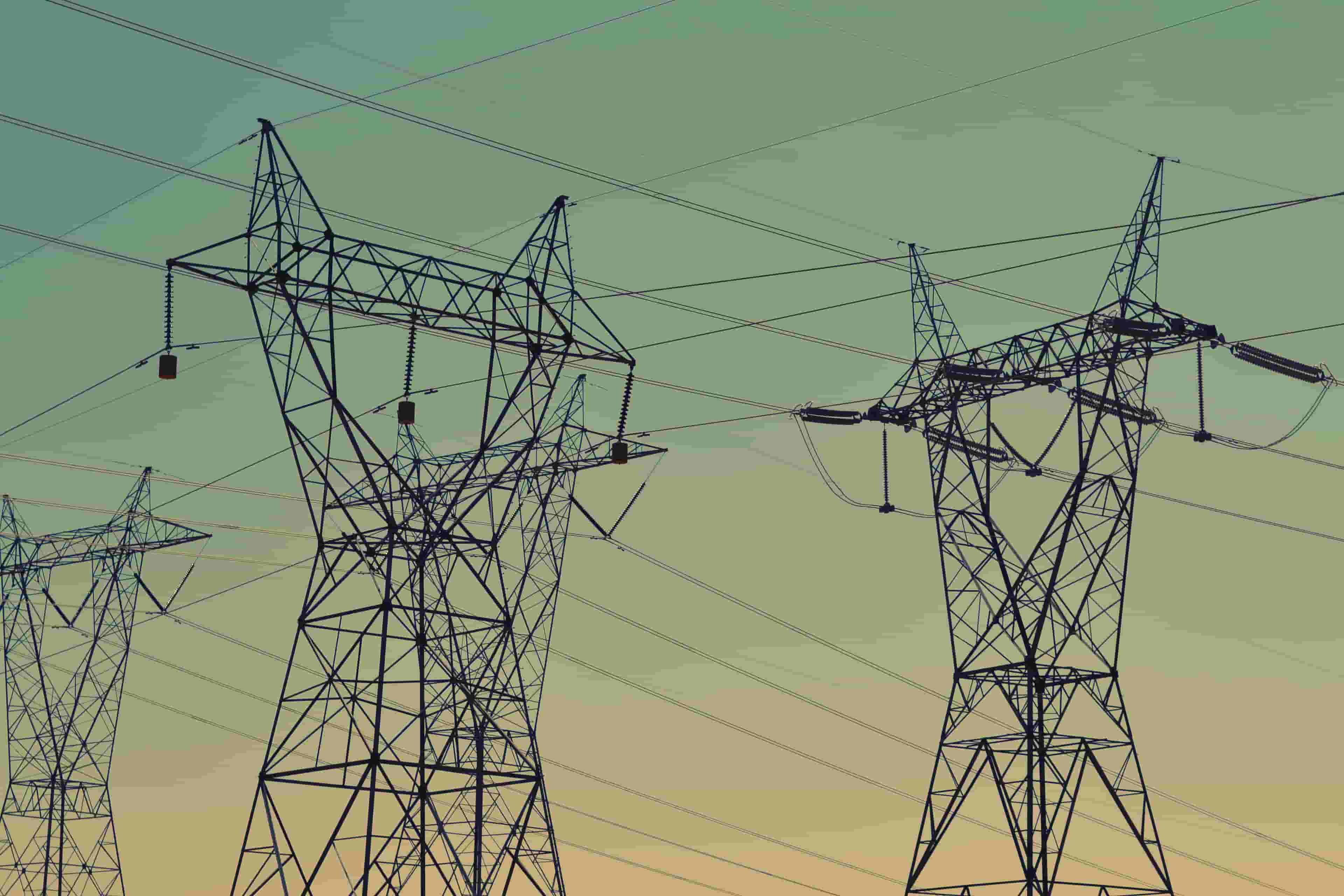 background image of overhead powerlines and towers